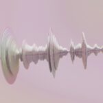 a sound wave is shown in the middle of a pink background